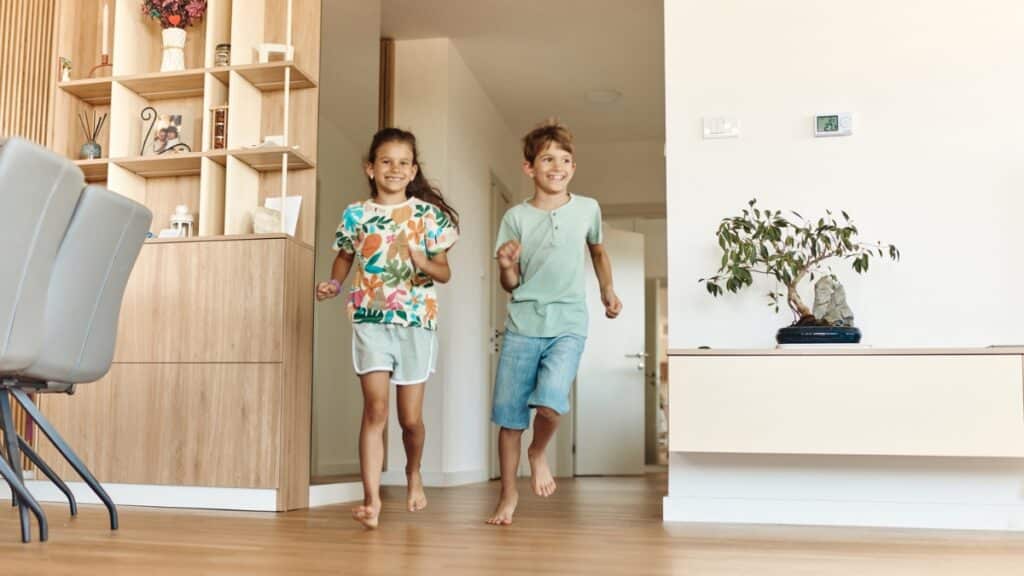 Children playing in a fresh home after professional maid service