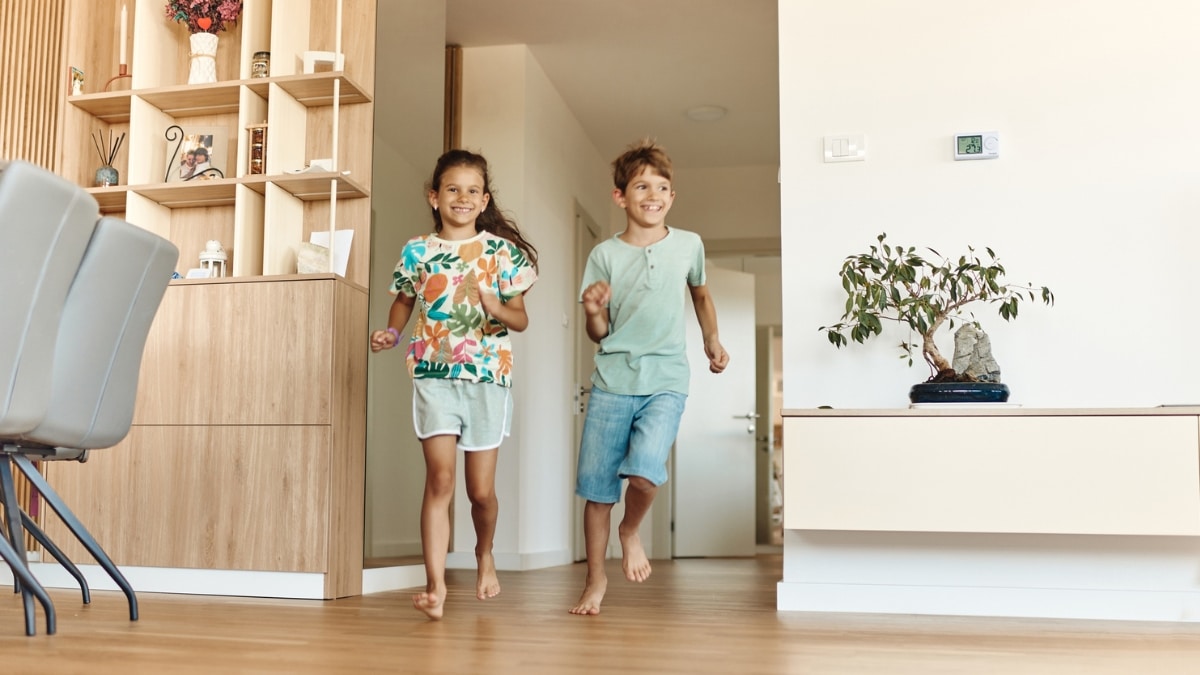 Children playing in a fresh home after professional house cleaning service.